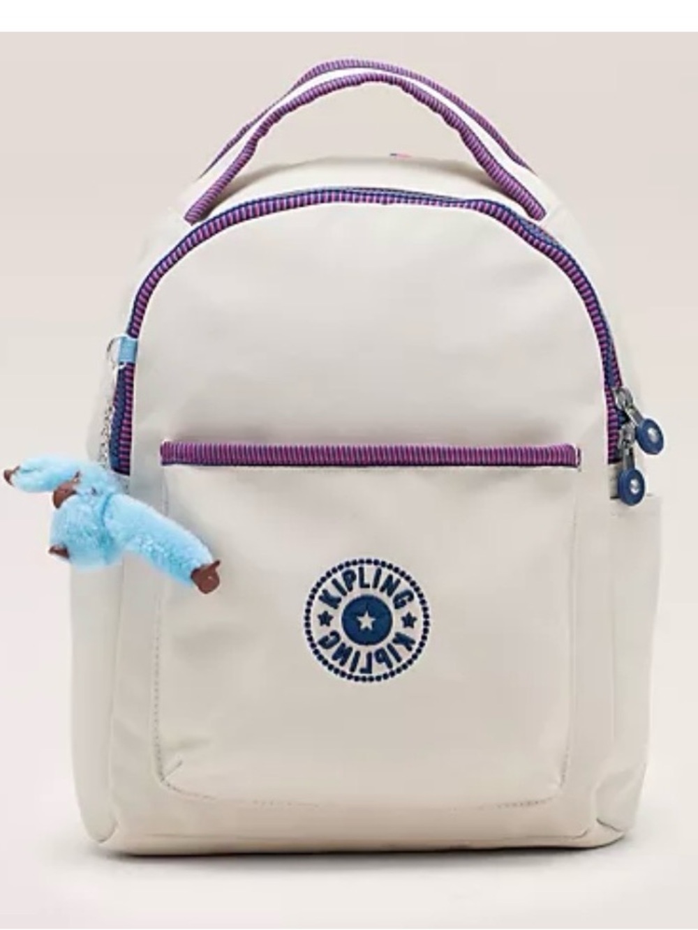 Kipling Cream Kids Backpack with Purple Trim and Blue Charm